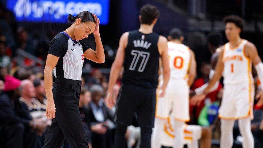 NBA referee goes down hard after brutal collision with camera operator during Hawks-Nets game