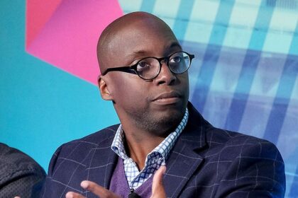 Sports commentator Michael Holley is 'fine' after fainting during live broadcast in terrifying scene