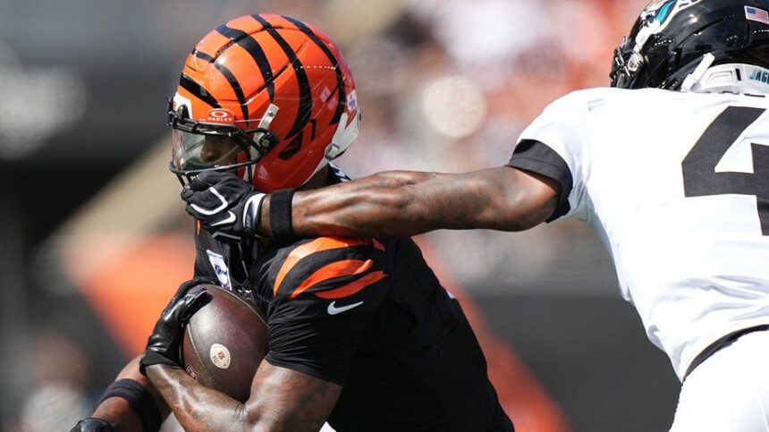 Bengals' Ja'Marr Chase suffers concussion after getting his facemask pulled and taking huge hit